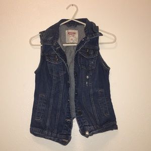 Dark washed sleeveless jean jacket